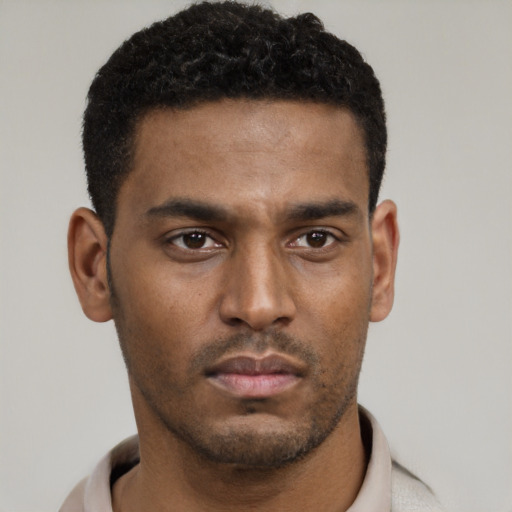 Neutral latino young-adult male with short  brown hair and brown eyes