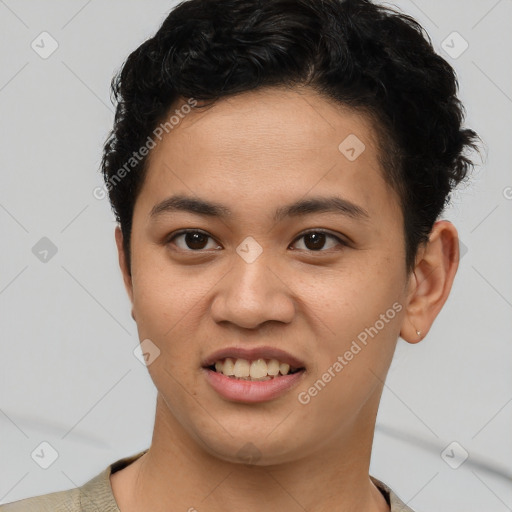 Joyful latino young-adult male with short  brown hair and brown eyes