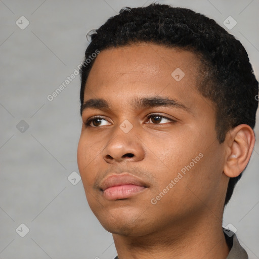 Neutral black young-adult male with short  black hair and brown eyes