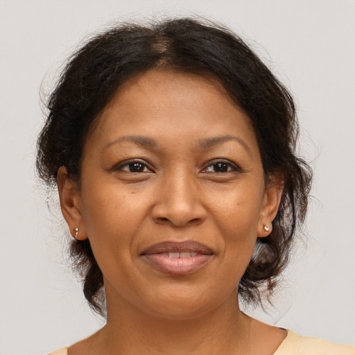 Joyful asian adult female with medium  brown hair and brown eyes