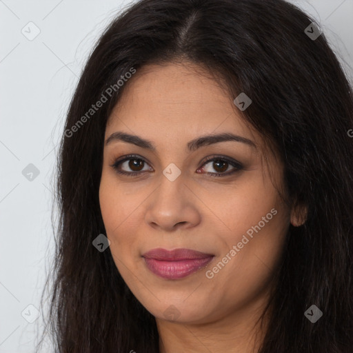 Joyful latino young-adult female with long  brown hair and brown eyes