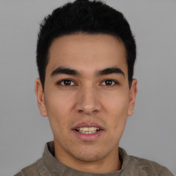 Neutral white young-adult male with short  black hair and brown eyes