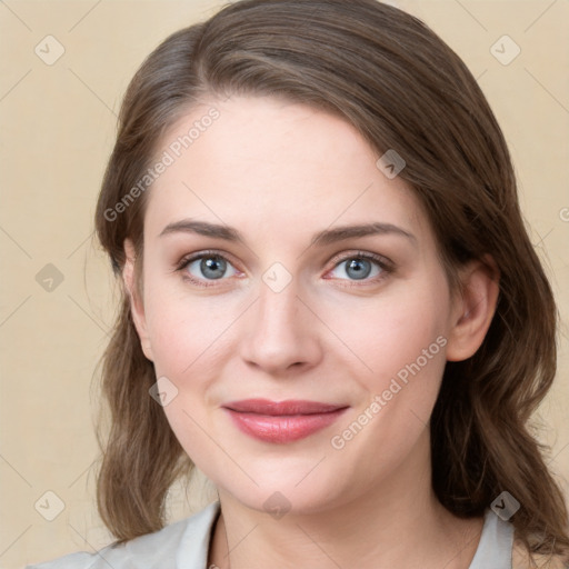 Joyful white young-adult female with medium  brown hair and green eyes