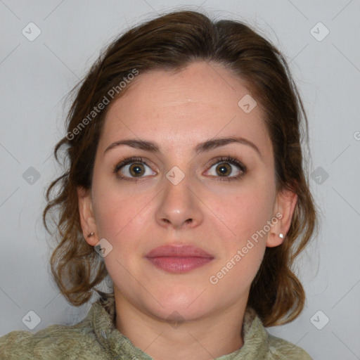 Joyful white young-adult female with medium  brown hair and green eyes