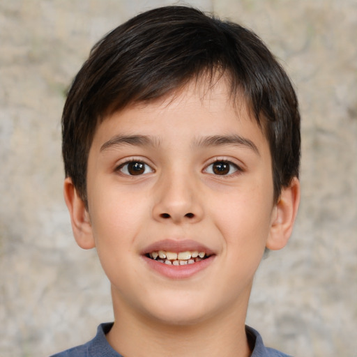 Joyful white child male with short  brown hair and brown eyes