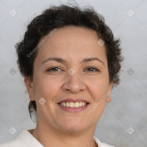 Joyful white adult female with short  brown hair and brown eyes