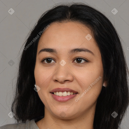 Joyful latino young-adult female with medium  brown hair and brown eyes