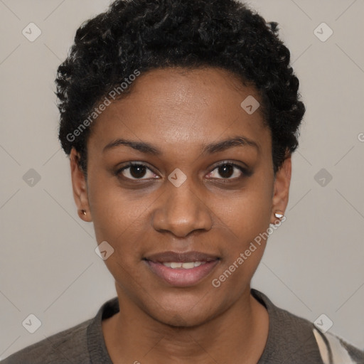 Joyful black young-adult female with short  black hair and brown eyes