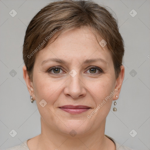 Joyful white adult female with short  brown hair and grey eyes