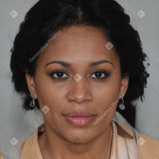 Joyful black adult female with short  brown hair and brown eyes