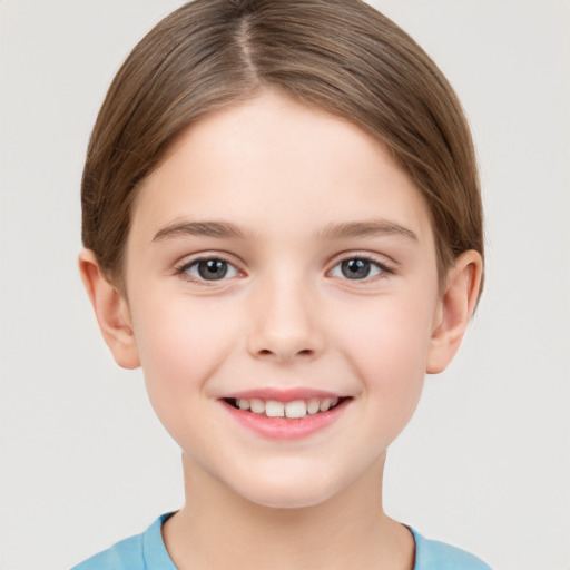 Joyful white child female with short  brown hair and brown eyes