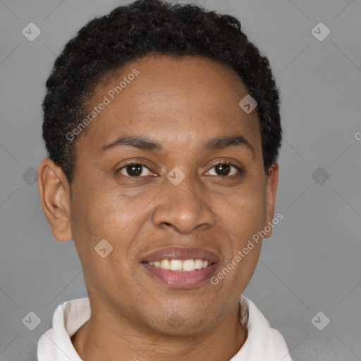 Joyful black adult male with short  brown hair and brown eyes