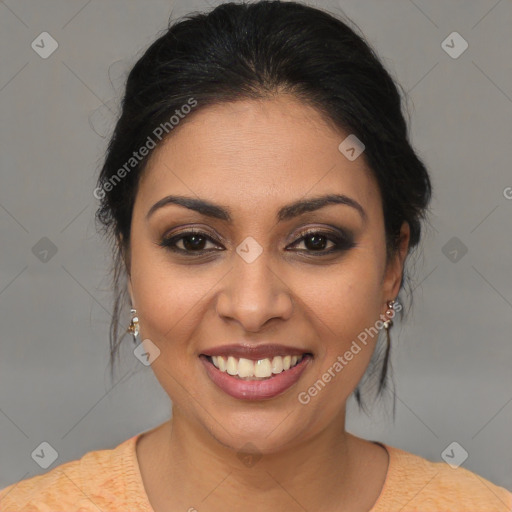 Joyful latino young-adult female with medium  brown hair and brown eyes