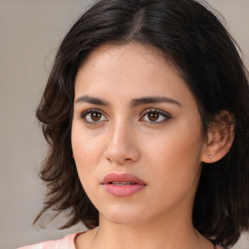 Neutral white young-adult female with medium  brown hair and brown eyes