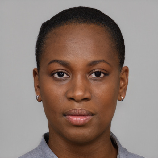 Neutral black young-adult female with short  black hair and brown eyes