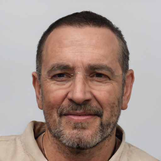 Joyful white middle-aged male with short  black hair and brown eyes