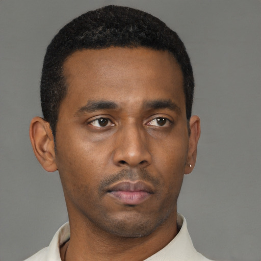 Neutral black young-adult male with short  black hair and brown eyes