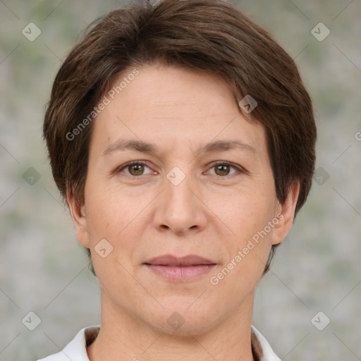 Joyful white adult female with short  brown hair and brown eyes