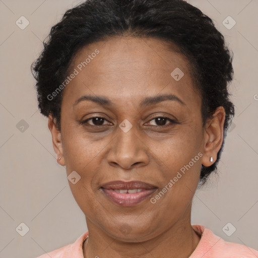 Joyful latino adult female with short  brown hair and brown eyes