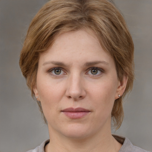 Neutral white young-adult female with medium  brown hair and grey eyes