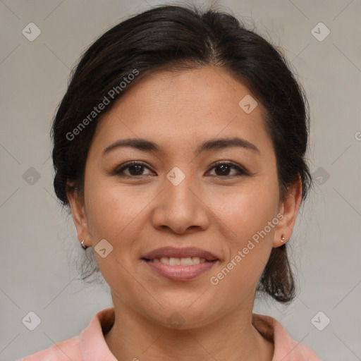 Joyful latino young-adult female with medium  brown hair and brown eyes