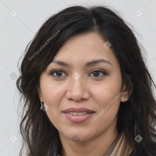Joyful asian young-adult female with long  brown hair and brown eyes