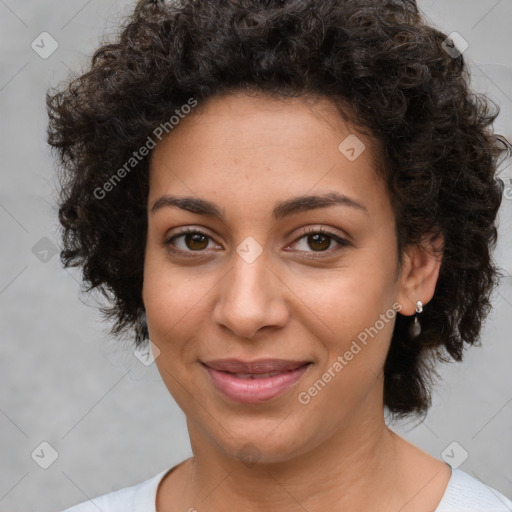 Joyful latino young-adult female with short  brown hair and brown eyes