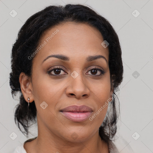 Joyful black young-adult female with medium  brown hair and brown eyes