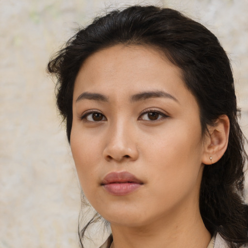 Neutral asian young-adult female with medium  brown hair and brown eyes