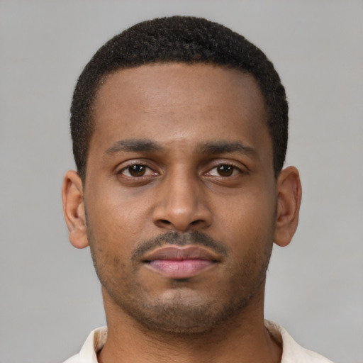 Neutral latino young-adult male with short  brown hair and brown eyes