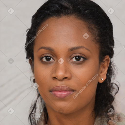 Joyful black young-adult female with long  brown hair and brown eyes