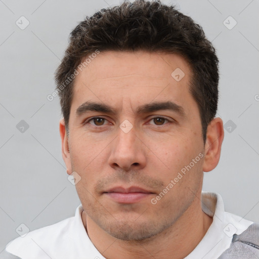 Neutral white adult male with short  brown hair and brown eyes