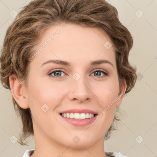 Joyful white young-adult female with medium  brown hair and green eyes