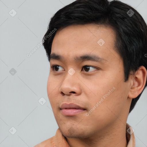 Neutral asian young-adult male with short  black hair and brown eyes