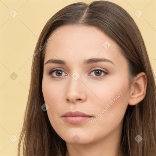 Neutral white young-adult female with long  brown hair and brown eyes