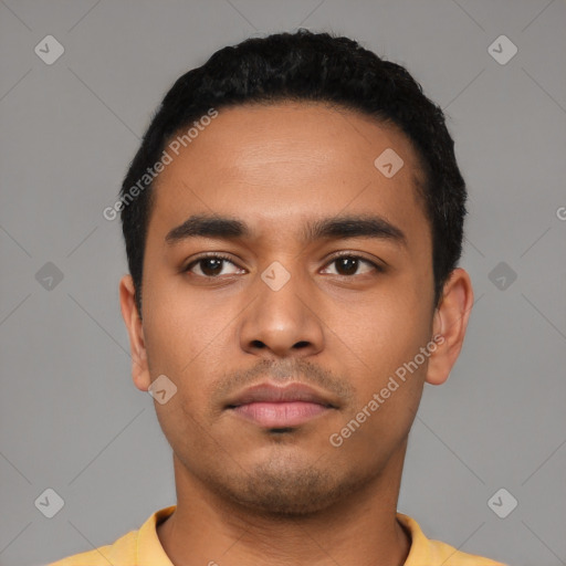 Neutral latino young-adult male with short  black hair and brown eyes