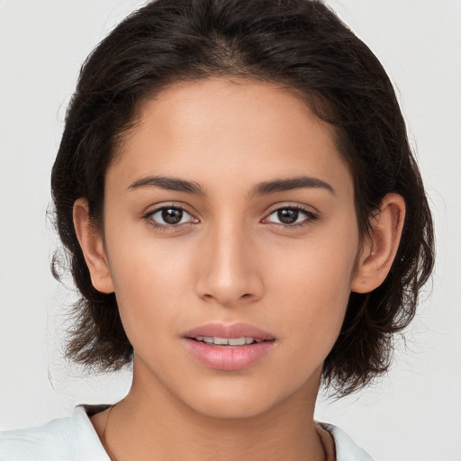 Neutral white young-adult female with medium  brown hair and brown eyes