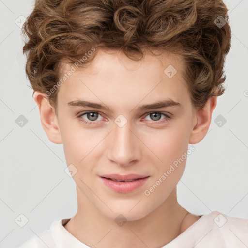 Joyful white child male with short  brown hair and brown eyes