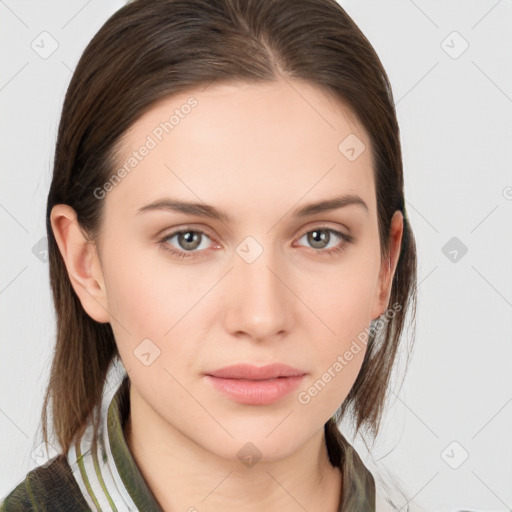 Neutral white young-adult female with medium  brown hair and grey eyes