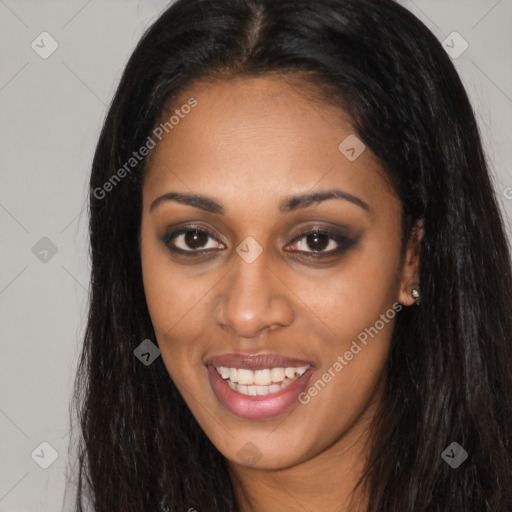 Joyful latino young-adult female with long  brown hair and brown eyes