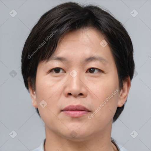 Neutral asian adult male with short  brown hair and brown eyes