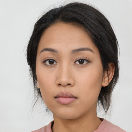 Neutral asian young-adult female with medium  black hair and brown eyes