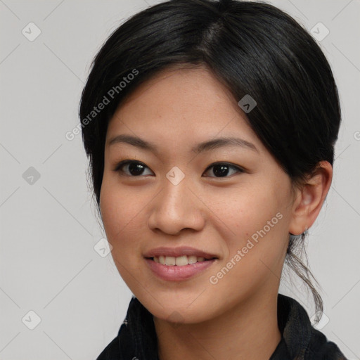 Joyful asian young-adult female with medium  black hair and brown eyes