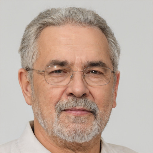 Neutral white middle-aged male with short  gray hair and brown eyes