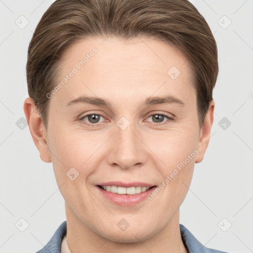 Joyful white young-adult female with short  brown hair and grey eyes