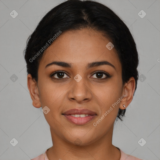 Joyful latino young-adult female with short  brown hair and brown eyes