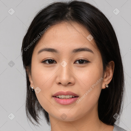 Joyful asian young-adult female with medium  brown hair and brown eyes