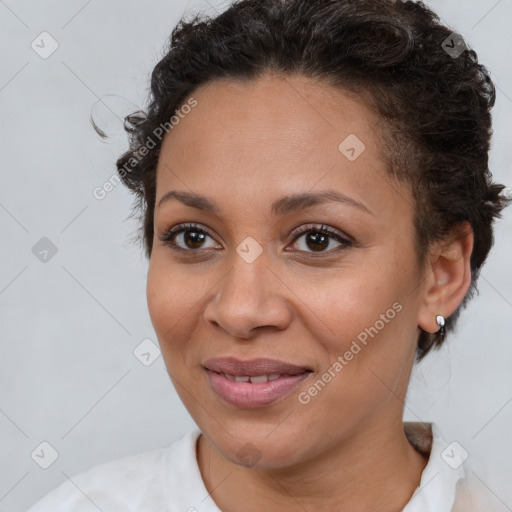 Joyful white adult female with short  brown hair and brown eyes