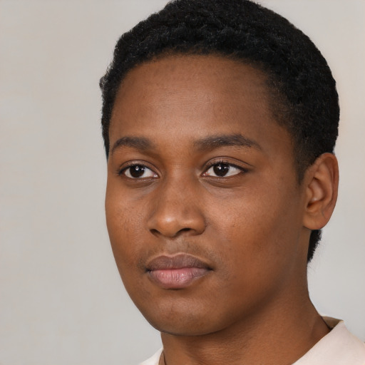 Neutral black young-adult female with short  black hair and brown eyes
