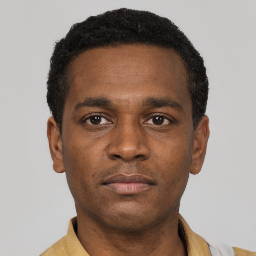 Neutral latino young-adult male with short  brown hair and brown eyes